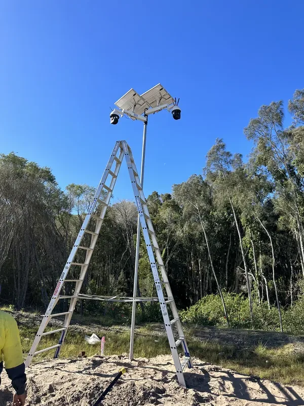 Netlink solar-powered 4G construction site security camera install on a portable ladder-tripod at a Newcastle & Hunter build site — site camera hire